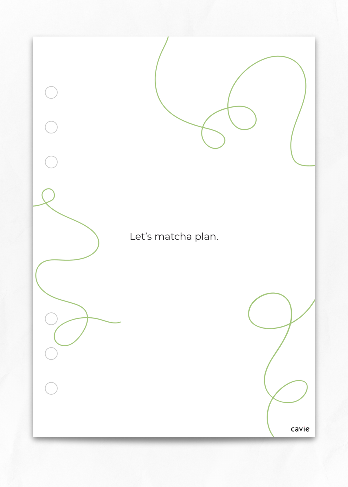 A minimalist white planner insert or notebook page with a light green abstract squiggle design, the text 'Let's matcha plan.' in the center, and the brand name 'cavie' in the bottom right corner.
