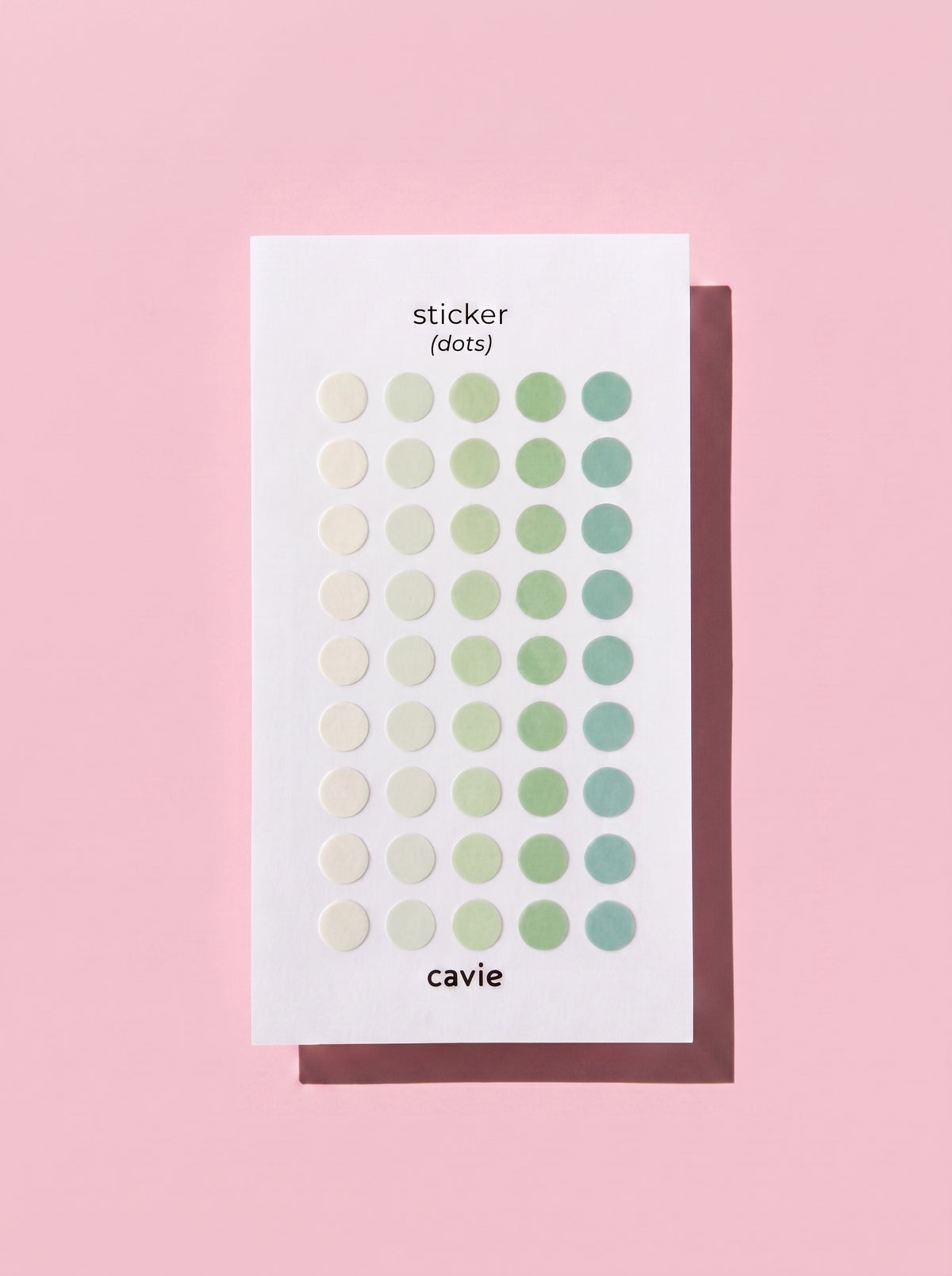 Cavie translucent dot stickers shown styled on a planner page